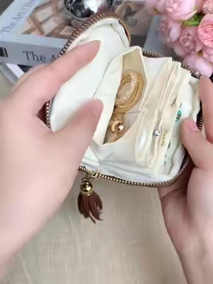 Here's your sign: stop fishing for earrings at the bottom of your bag. Grab this pouch. Your future self will thank you. #jewelrypouch #jewelrystorage #jewelryorganization #jewelryorganizer #olebrandselect