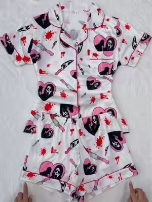 I NEED this for every spooky movie night. 🍿The mix of pink hearts, creepy masks, knives, and blood splatters is honestly Halloween perfection. 👻🔪#pajamas #spookyseason #gothicstyle #halloweenoutfit #TikTokshopbacktoschool 