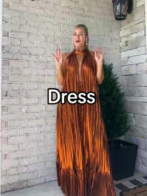The only word for this pleated maxi dress is speechless. If you are short, you’ll have to alter the back as it comes down extremely low. If you’re a tall girl, this dress was made for you. #halterdress #elegantdress #pleateddress #maxidress #pleatedmaxidress 