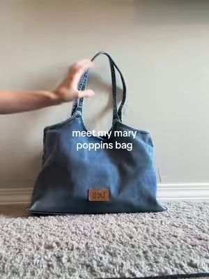 carries the weight of the world .. #denimpurse #whatsinmybag 