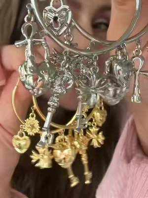 Hands down, my new favorite earrings!  @GANIA  #earrings #hoops #hoopearrings #charms #affordablejewelry 