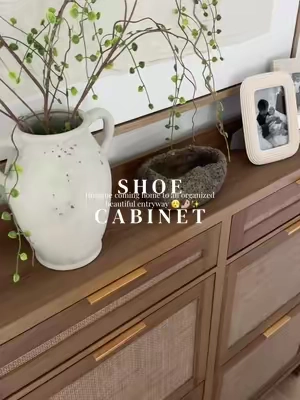 A shoe cabinet that looks this beautiful + holds this many shoes is a must 🤌🏼😮‍💨    #modernentrywaydecor #cozyhome #shoecabinet #fallhomedecor #fallaesthetic 