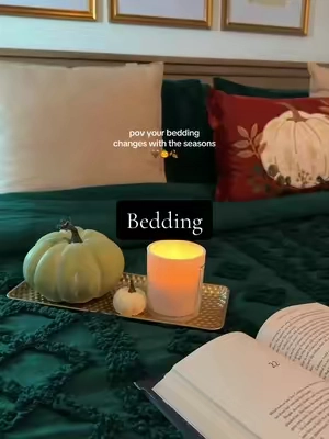 a fall candle, a book, and a cozy comforter. 🤎 #falldecor #comforterset #cozyhome #bohodecor #bedding 
