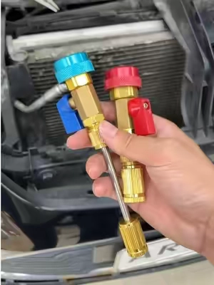 AC not blowing cold? Don't rush to the shop. Most of the time, it's not the compressor — it's just a bad valve core. A shop will charge you hundreds to replace a $2 part. With this GJANSH valve core remover tool, you can swap it yourself in 3 minutes. No refrigerant loss. Zero waste. Works on high and low pressure ports. Compatible with R134A, R1234yf, and R22. Built-in ball valve seals tight, no leaks. One tool, one fix, pays for itself. Link below — grab it before they're gone.#R134A #valvecore #ACtool #ACrepair #carcare   