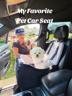 This @PETSFIT_Official pet car seat it has quickly become my favorite! It has thick memory foam, washable covers and it fastens in like no other car seat I found ! This will keep your pet sitting nice and high enjoying the ride while fastened in safely and securely! #tiktokshopcreatorpicks #petcarseat #petsfit @PETSFIT @Petsfit_official 