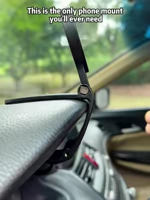 Hey, someone messed up on TikTok because this phone mount is on sale right now.
 If you're still holding your phone while driving or constantly looking down for directions, you need to see this.
 Just clip it onto your dashboard or windshield, attach your phone, and you're ready to go in seconds.
 The clamp holds your phone securely, even on bumpy roads, so you can use GPS safely without taking your hands off the wheel.
 It's compact, easy to move between cars, and makes driving a whole lot more convenient.
 If you still see the orange cart, grab one before the sale ends.#TikTokShop #PhoneMount #CarAccessories #CarGadgets #GPS