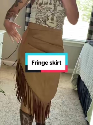 Western with a little movement 🤎 This faux-suede fringe skirt has an asymmetrical hem, draped fit + tons of fringe that makes the whole outfit come alive with boots. #fringeskirt #cowgirlstyle #westernskirt #tiktokbacktoschool #cowgirlstyle 