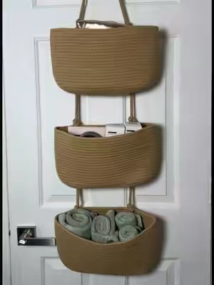 A fun little way to personalize your guests’ stays each time.  Also adds extra storage for those who are small space living (like me)!  #storagebaskets #overthedoororganizer #hostingtips #ttspathways #tiktokshopcreatorpicks 