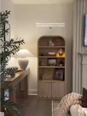 This arched bookshelf instantly elevated the whole space. 🤎✨ The perfect mix of storage + beautiful home decor. #ArchedBookshelf #Bookshelf # #HomeDecor #CozyHome   #TikTokshopbacktoschool 