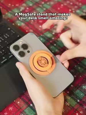 A phone stand that makes your entire desk smell good! 🌸📱 #magsafestand #desksetup #aesthetictech #iphoneaccessories #TikTokshopbacktoschool 