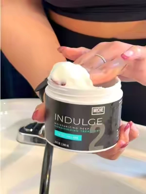 Part 2 | Dry, brittle curls need more than just a styler 👩‍🦱👏⁠ ⁠ After cleansing, it's time to restore moisture. INDULGE Moisturizing Deep Conditioning Treatment is infused with:⁠ ⁠ 🌿Slippery Elm⁠ 💦 Marshmallow Root⁠ ✨ Babassu Oil⁠ ⁠ These plant-based ingredients work together to deeply hydrate, improve slip, and make detangling easier. ⁠ ⁠ Shop INDULGE on TikTok Shop ⁠ #MicheBeauty #HealthyCurls #CurlCommunity #WashDayMadeEasy #CurlyTransformation⁠ ⁠ ⁠