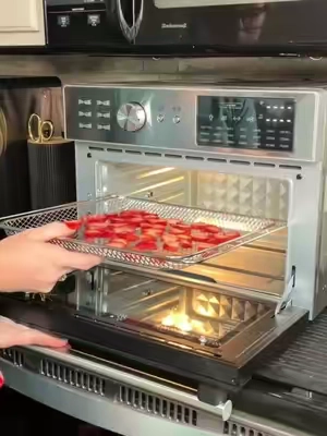 This isn’t an air fryer… it’s basically an entire KITCHEN in a box. 😂🙌 This 32-quart extra-large air fryer toaster oven can air fry, bake, toast, roast, PROOF BREAD and even make a whole rotisserie chicken. 🍗🥖 If you’re going to give up this much counter space, it better earn its keep—and THIS ONE DOES. #AirFryer #AirFryerOven #ToasterOven #KitchenMustHaves #KitchenAppliances   