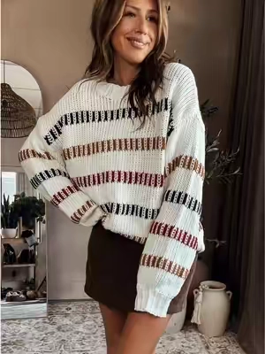 Sweater weather but make it cute. 🤎 The oversized knit + mini skirt combo is so fall coded. #FallFashion #SweaterWeather #MiniSkirt #FallOutfit #BoutiqueFashion