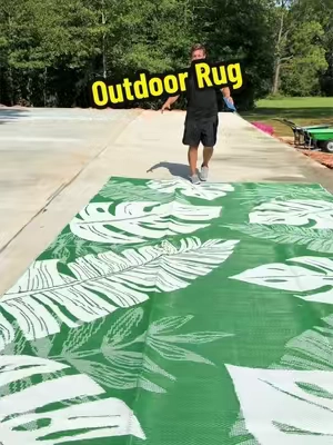Give your patio or deck a quick refresh with this reversible woven outdoor rug that folds up for storage and travel. #summerfinds #TikTokshopbacktoschool #PatioRug #OutdoorLiving #PatioIdeas 