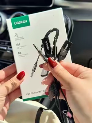 ¿Tu auto no tiene Bluetooth? 😩 Este adaptador de UGREEN lo soluciona en segundos — conecta tu celular por AUX y escucha música o llamadas sin cables enredados 🎶🚗 #adaptadorbluetooth #UGREEN #tiktokshopcreatorpicks #paratii #hispanosenusa 