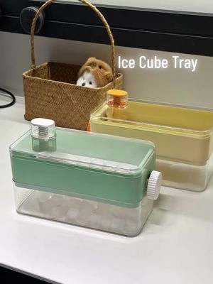 This press‑down ice tray makes iced drinks so much easier. #icetray #icecubetray #iceddrinks #kitchengadgets #KitchenHacks 