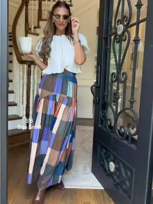 A look for less that you absolutely need!! This stunning and super fun fall maxi skirt is adorable! Love the gorgeous colors and flowy fit! So fun to style. I’m 5’8 wearing a small. #maxiskirt #fallskirt #falloutfits #skirt #fallfits  @Asvivid 