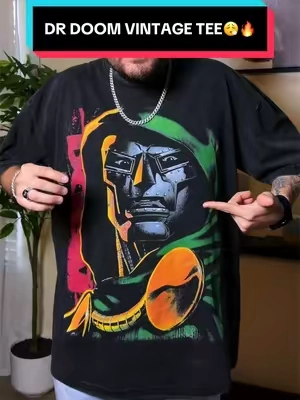 This Doctor Doom tee from Culture Kings is ridiculously clean. 🔥 The heavyweight black wash gives it that perfect vintage streetwear look, and the graphics make the whole piece stand out without doing too much. 🥶 Limited stock and sizes are moving fast, so grab yours while they’re still available. Massively discounted + FREE 3-day delivery on orders over $60 📦💨@Culture Kings #culturekings #mensfashion #mensstyle #streetwearstyle #TikTokShopFinds 