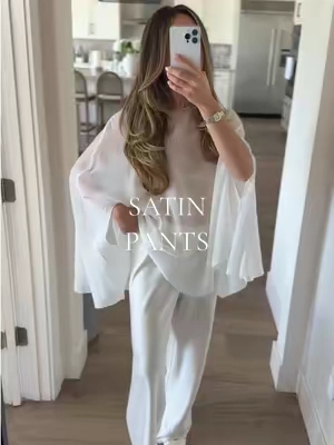 Satin pants that come in petite, regular, and tall. Wearing a size S PETITE, I'm 5'3" 120 Ibs (35" bust, 26.5" waist, 36.5" hips). @April Seven Studio 