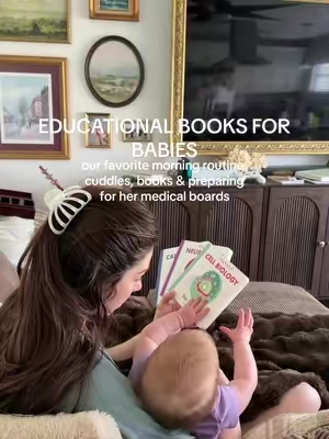 As an old ER RN, I might be a little biased when it comes to our book choices 😂📚 but I love making reading part of our morning routine. She gets the cuddles and colorful pictures, and I get to pretend we’re starting her medical education early. 😂 Cardiology, neurology, anatomy… gotta make her more smarter somehow 🤍 Maybe I’m raising a future healthcare girlie, maybe she just likes turning the pages — either way, I love this little routine with her. #babybooks #educationalbooks #babylearning #educationaltoys  #sahm 
