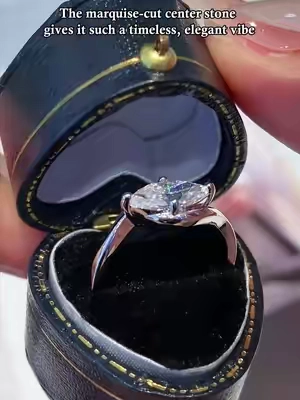 The marquise-cut center stone gives it such a timeless, elegant vibe #moissanite #jewelry #ring #backtoschoolshopping #gift 