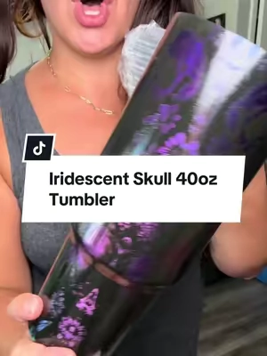 Halloween tumbler season has officially started 💀🖤 This 40 oz skull tumbler might be the coolest spooky season cup I’ve found. The purple + black iridescent skull designs are SO good, and there are multiple styles to choose from. Plus it’s a full 40 oz insulated stainless steel tumbler with a handle + straw — so it’s actually practical for everyday use too. 💜 If you’re already ready for Halloween, spooky season and fall, this one belongs in the rotation. 💀 Multiple skull designs 🖤 40 oz size 🥤 Handle + straw ✨ Insulated stainless steel 🎃 Perfect spooky season accessory Which design would you get?! #tiktokshopcreatorpicks #TikTokshopbacktoschool #tiktokshophalloween 