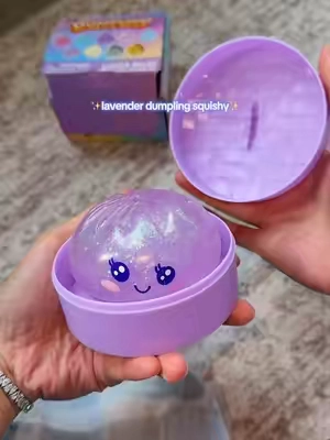 it’s sooooo prettyyy💜💜 #squishydumplings #dumplingsquishy #glitterdumpling #squishy #purpledumpling 