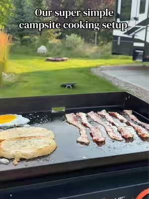 This table is EXACTLY what we were looking for for our campsite cooking setup. It’s folds completely flat to fit in our pass thru storage and it has wheels making set up a breeze. #rvlife #outdoorcooking #rvtiktok #grillingseason #campingseason 