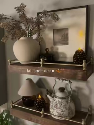 The coziest little addition to my fall shelves 🤎🍂 These pinecone candles give off the prettiest warm flickering glow and make everything feel extra cozy and cottagecore. 🕯️ #FallShelfDecor #FallDecor #CozyHome #CottagecoreHome #TikTokShopCreatorPicks