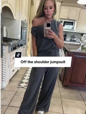 Effortless one-and-done style. This Cider asymmetrical neck jumpsuit gives chic, elevated comfort with a flattering wide-leg fit. #CiderFashion #CiderJumpsuit #WomensFashion #JumpsuitStyle #EffortlessStyle
