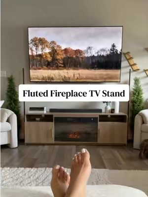 I’m in LOVE! If you’ve been wanting a fireplace for the holidays, don’t miss this deal! #fireplace #tvstand #flutedfurniture #affordablefurniture #cozyhome 