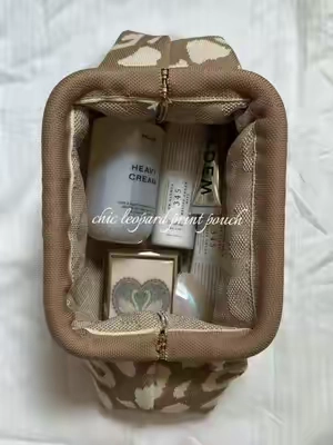 hold so much and perfect for traveling! Many more options available🧸🍂✨ #fallaesthetic #makeuppouch #chicaesthetic #lepordprint #y2k it girl 2000s travel essentials elegant makeup bag Christmas gift TikTok shop Black Friday 