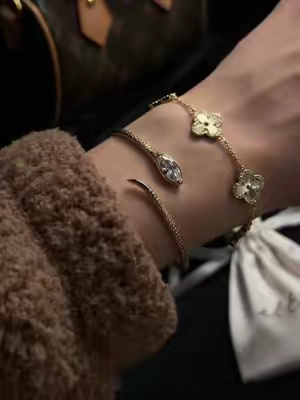 serpent jewelry >> 🐍✨ #ettikajewlery #serpentjewelry #bracelet #goldcuff #braceletstack @Ettika 