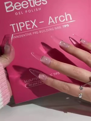 NEW ARRIVALS : Tipex Arch 💅🏼✨ TIPEX Arch might be my new fave 😭💅🏼 Fuller apex, defined C-curve + that TIPEX durability I already LOVE… and the price right now?! RIDICULOUS 👀✨ @BeetlesGelPolish #gelxnails #tipexarch #diynails #fullcovernailtips #nailinspo 