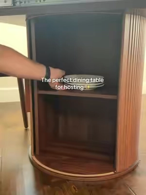 This extendable dining table goes from a round table to a larger oval table when you need extra seating, plus the center base has hidden storage built right in. The warm wood finish and curved pedestal design give it such a polished look for a dining room or kitchen. 🤎 #ExtendableDiningTable #DiningTable #RoundDiningTable #DiningRoomFurniture #KitchenTable extendable dining table round to oval dining table wood dining table pedestal dining table dining table with storage expandable kitchen table round dining room table space saving dining table modern wood dining table