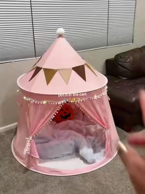 I thought play tents always came with a huge price tag but this adorable tent is actually affordable. #playtent #kidsplaytent #playroominspo #kidsplayroom #toddlergiftideas 