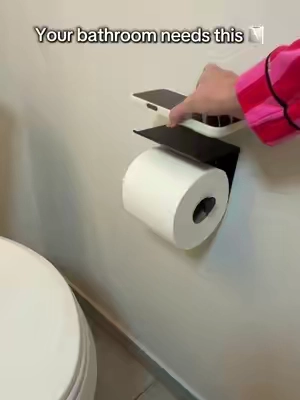 🧻📱 Give your bathroom a little more storage without taking up extra space. This wall-mounted toilet paper holder has a built-in shelf for your phone, wipes, or other small bathroom essentials, and the black finish gives it a clean, modern look. #toiletpaperholder #toiletpaperholderwithshelf #bathroomstorage #bathroomorganization #bathroomfinds toilet paper holder with shelf wall mounted toilet paper holder black toilet paper holder bathroom phone shelf bathroom storage shelf toilet paper holder with phone shelf small bathroom storage bathroom organization modern bathroom accessories bathroom essentials