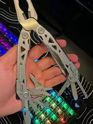 Gerber Suspension NXT 15-in-1 multitool with pliers, knife, screwdrivers, scissors and essential EDC tools. Compact stainless steel multitool for everyday carry, work, camping, hiking and outdoor gear. #multitool #everydaycarry #utilitytool #edctools 