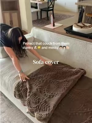 A little living room refresh that makes the couch feel softer and look a whole lot more put together. #sofacover #couchcover #livingroomrefresh #cozyhome #homedecorfinds