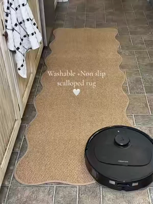 The perfect kitchen runner. She is affordable, cute, machine washable, and non slip. #kitchenrug #kitchendecor #homedecor #nonsliprug #scallopedrug 